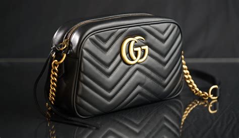 how to tell if a gucci purse is real|identify vintage gucci bags.